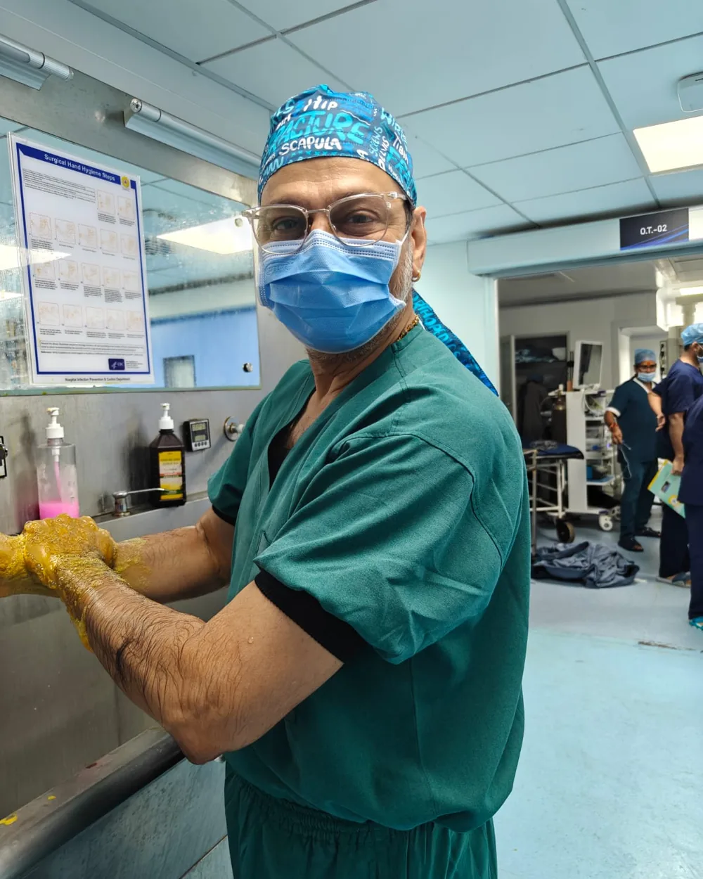Dr. Kantilal G. Jain preparing for surgery
